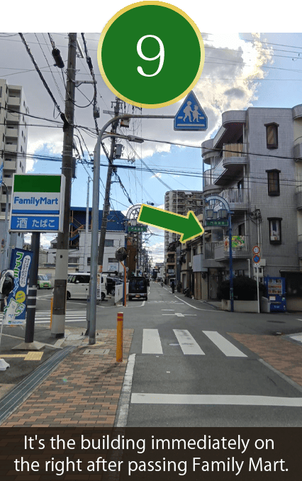 It's the building immediately on the right after passing Family Mart.